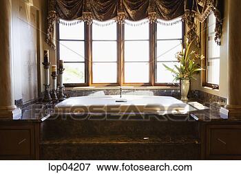 Picture - large jacuzzi 
tub in master 
bathroom. fotosearch 
- search stock 
photos, pictures, 
images, and photo 
clipart