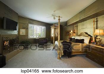 Stock Image - large master bedroom 
with four post 
bed. fotosearch 
- search stock 
photos, pictures, 
images, and photo 
clipart
