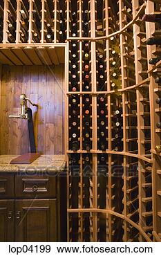 Stock Photograph - large wooden wine 
cellar with wine 
bottle opener. 
fotosearch - search 
stock photos, 
pictures, images, 
and photo clipart