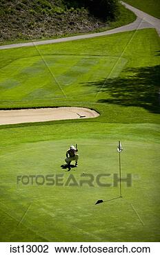 Stock Photo - man on golf course. 
fotosearch - search 
stock photos, 
pictures, images, 
and photo clipart