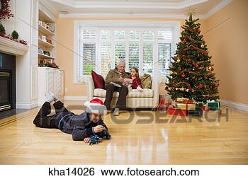 Stock Photo - man and grandchildren 
together at christmas. 
fotosearch - search 
stock photos, 
pictures, images, 
and photo clipart