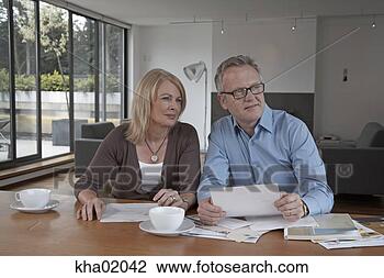 Stock Photo - mature couple 
reading mail. 
fotosearch - search 
stock photos, 
pictures, images, 
and photo clipart