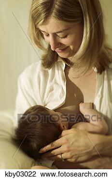 Stock Photo - mother nursing 
newborn. fotosearch 
- search stock 
photos, pictures, 
images, and photo 
clipart