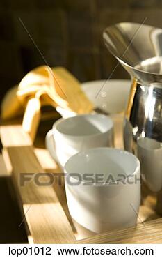 Stock Photo - mugs and metal 
pitcher on tray. 
fotosearch - search 
stock photos, 
pictures, images, 
and photo clipart