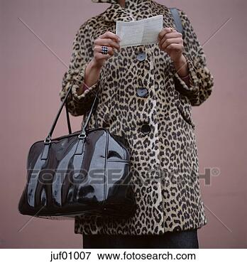 Picture - older woman reading 
note. fotosearch 
- search stock 
photos, pictures, 
images, and photo 
clipart