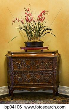 Stock Photo - ornate dresser 
with pink flowers. 
fotosearch - search 
stock photos, 
pictures, images, 
and photo clipart