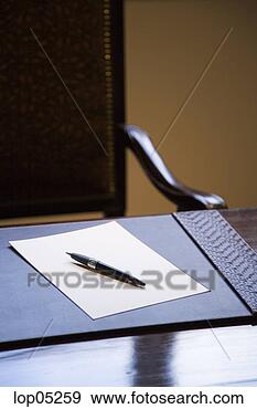 Stock Photograph - pen and blank 
paper in home 
office. fotosearch 
- search stock 
photos, pictures, 
images, and photo 
clipart