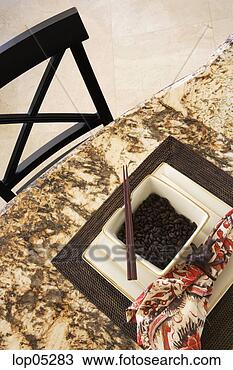 Stock Photo - place settings 
at kitchen bar. 
fotosearch - search 
stock photos, 
pictures, images, 
and photo clipart