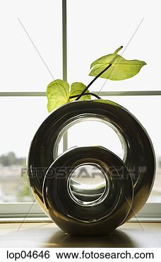 Stock Photo - plant in round 
vase. fotosearch 
- search stock 
photos, pictures, 
images, and photo 
clipart