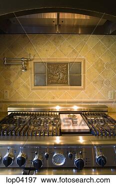 Picture - professional grade 
range with pot 
faucet. fotosearch 
- search stock 
photos, pictures, 
images, and photo 
clipart