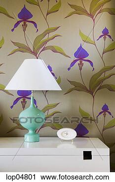 Stock Photography - retro lamp and 
clock against 
flowered wallpaper. 
fotosearch - search 
stock photos, 
pictures, images, 
and photo clipart
