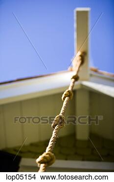 Stock Photo - rope on kid's 
playhouse. fotosearch 
- search stock 
photos, pictures, 
images, and photo 
clipart
