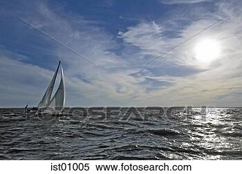 Stock Image - sailboat sailing 
on open water. 
fotosearch - search 
stock photos, 
pictures, images, 
and photo clipart