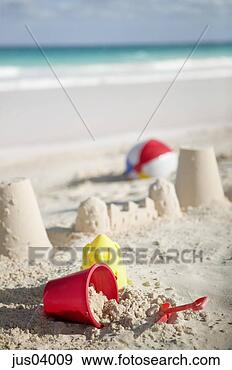 Stock Photograph - sandcastle and 
buckets on beach. 
fotosearch - search 
stock photos, 
pictures, images, 
and photo clipart