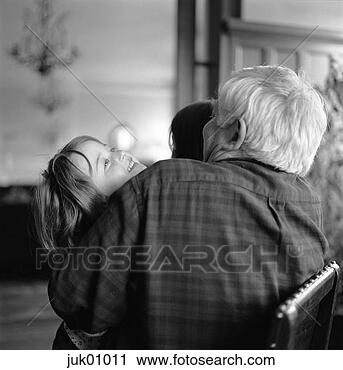 Stock Photography - senior man playing 
with granddaughter. 
fotosearch - search 
stock photos, 
pictures, images, 
and photo clipart