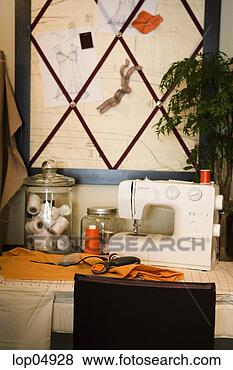 Stock Photo - sewing machine 
in clothes making 
shop. fotosearch 
- search stock 
photos, pictures, 
images, and photo 
clipart