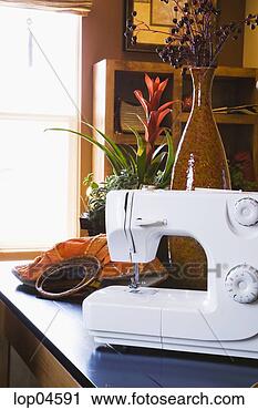 Stock Photography - sewing machine 
in home business. 
fotosearch - search 
stock photos, 
pictures, images, 
and photo clipart