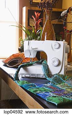 Stock Photo - sewing machine 
in home business. 
fotosearch - search 
stock photos, 
pictures, images, 
and photo clipart