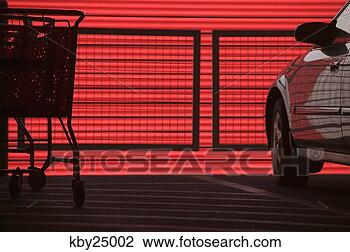 Stock Photo - shopping cart 
in a parking lot. 
fotosearch - search 
stock photos, 
pictures, images, 
and photo clipart