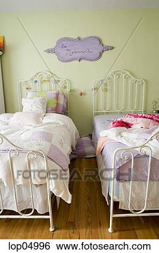 Stock Photo - sisters pastel 
colored bedroom. 
fotosearch - search 
stock photos, 
pictures, images, 
and photo clipart