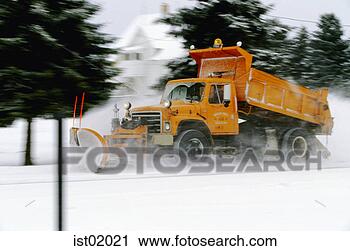 Stock Photography - snowplow driving 
on road. fotosearch 
- search stock 
photos, pictures, 
images, and photo 
clipart