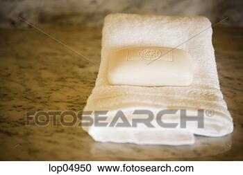 Stock Photography - soap on towel 
in bathroom. fotosearch 
- search stock 
photos, pictures, 
images, and photo 
clipart
