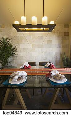 Stock Photograph - southwest style 
dining room with 
candle chandelier. 
fotosearch - search 
stock photos, 
pictures, images, 
and photo clipart