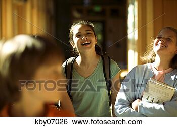 Stock Photo - students socializing 
in school hallway. 
fotosearch - search 
stock photos, 
pictures, images, 
and photo clipart