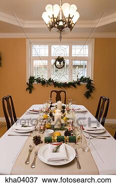 Picture - table set for 
christmas dinner. 
fotosearch - search 
stock photos, 
pictures, images, 
and photo clipart