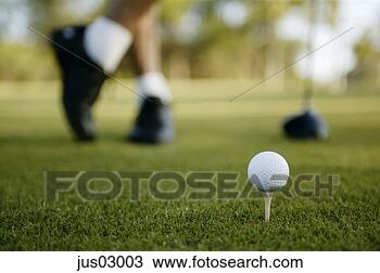 Stock Photo - teed golf ball 
on course. fotosearch 
- search stock 
photos, pictures, 
images, and photo 
clipart