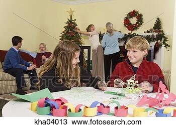 Stock Photo - teenagers making 
christmas snowflakes. 
fotosearch - search 
stock photos, 
pictures, images, 
and photo clipart