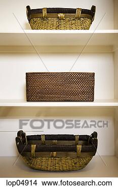 Stock Photo - three baskets 
displayed on shelves. 
fotosearch - search 
stock photos, 
pictures, images, 
and photo clipart