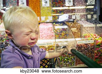 Stock Photo - toddler boy crying 
in candy aisle 
of grocery store. 
fotosearch - search 
stock photos, 
pictures, images, 
and photo clipart