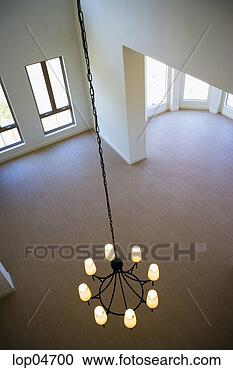 Stock Photography - view from above 
chandelier in 
empty home. fotosearch 
- search stock 
photos, pictures, 
images, and photo 
clipart