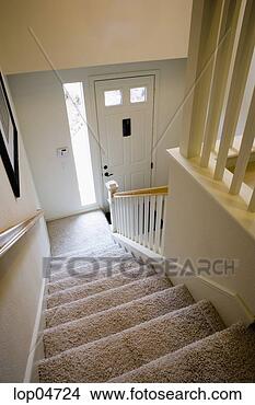 Stock Photo - view down staircase 
to front door. 
fotosearch - search 
stock photos, 
pictures, images, 
and photo clipart