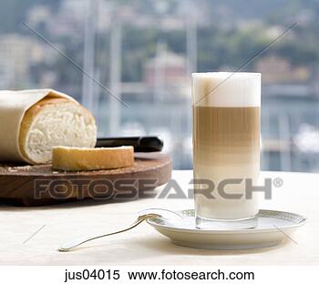 Stock Image - warm drink with 
loaf of bread. 
fotosearch - search 
stock photos, 
pictures, images, 
and photo clipart