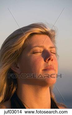 Stock Photo - woman inhaling. 
fotosearch - search 
stock photos, 
pictures, images, 
and photo clipart