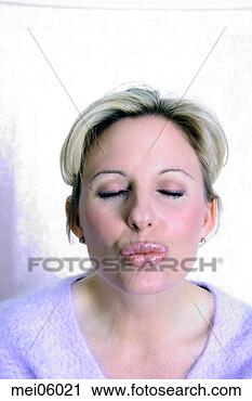 Stock Photography - woman puckering 
lips. fotosearch 
- search stock 
photos, pictures, 
images, and photo 
clipart
