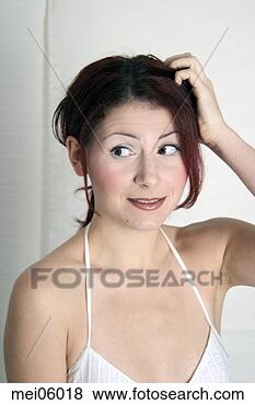Stock Photo - woman with questioning 
expression. fotosearch 
- search stock 
photos, pictures, 
images, and photo 
clipart