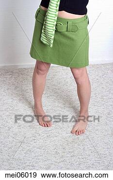 Stock Photograph - woman's bare feet 
on carpet. fotosearch 
- search stock 
photos, pictures, 
images, and photo 
clipart