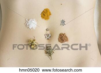 Stock Photography - woman's pierced 
navel with spices 
around it. fotosearch 
- search stock 
photos, pictures, 
images, and photo 
clipart