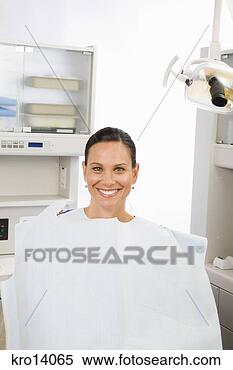 Stock Image - woman sitting 
in dental chair. 
fotosearch - search 
stock photos, 
pictures, images, 
and photo clipart