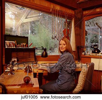 Stock Image - woman sitting 
in workshop. fotosearch 
- search stock 
photos, pictures, 
images, and photo 
clipart