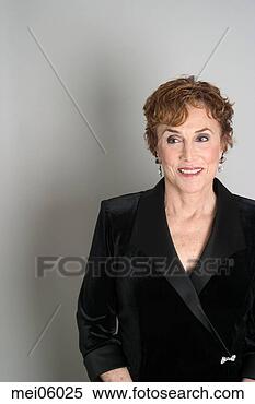 Stock Image - woman smiling 
in evening gown. 
fotosearch - search 
stock photos, 
pictures, images, 
and photo clipart