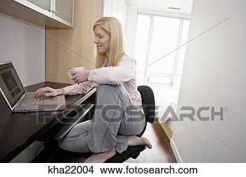 Stock Photo - woman using laptop. 
fotosearch - search 
stock photos, 
pictures, images, 
and photo clipart