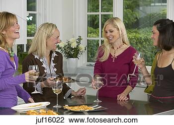 Stock Photo - women friends 
drinking white 
wine. fotosearch 
- search stock 
photos, pictures, 
images, and photo 
clipart