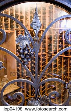 Stock Photo - wraught iron details 
on door to wine 
cellar. fotosearch 
- search stock 
photos, pictures, 
images, and photo 
clipart