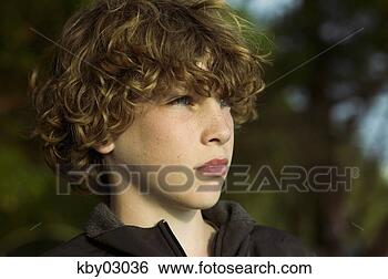 Stock Photo - young boy's face. 
fotosearch - search 
stock photos, 
pictures, images, 
and photo clipart