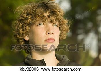 Stock Photo - young boy's face. 
fotosearch - search 
stock photos, 
pictures, images, 
and photo clipart