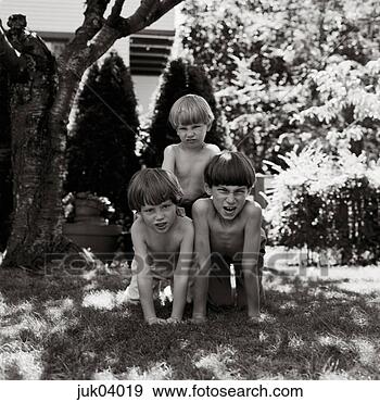 Stock Photograph - young boys in 
human pyramid. 
fotosearch - search 
stock photos, 
pictures, images, 
and photo clipart